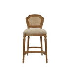 Taburete alto Wilbrandt de roble: tapizado de lino, ribete con clavos decorativos, patas talladas
