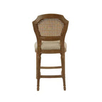 Taburete alto Wilbrandt de roble: tapizado de lino, ribete con clavos decorativos, patas talladas